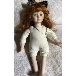 Geppeddo Musical Porcelain Doll 'The Sun Will Come Out Tomorrow" Red Hair